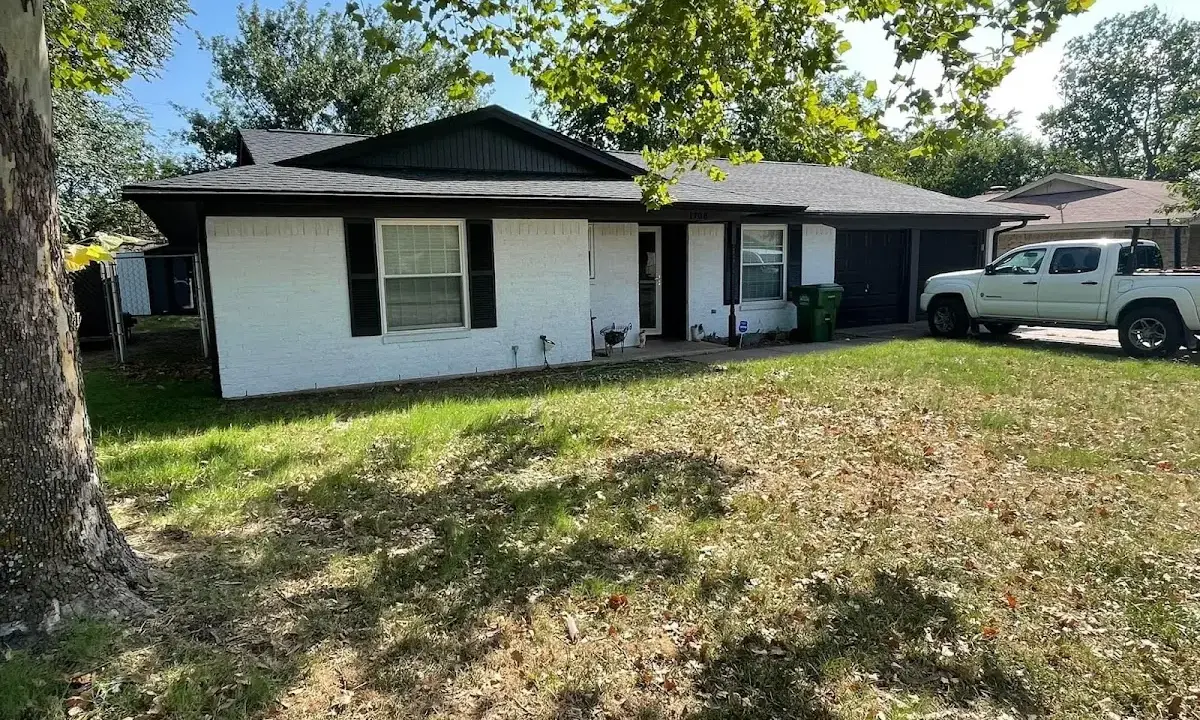 Professional roofing crew working on a residential roof in Hanover Park